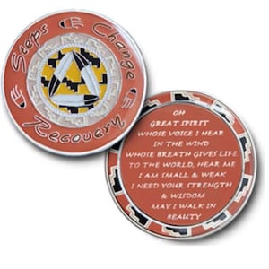 May include: Two round, copper-colored metal tokens with a Native American design. The front token has the words "Steps Change Recovery" in a circle around a stylized Native American design. The back token has a prayer to the Great Spirit written in a circle around a stylized Native American design.