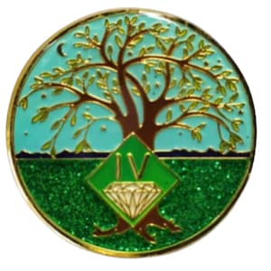 May include: A gold-coloured pin with a green diamond and the Roman numeral IV. The pin features a stylised tree with green leaves and a blue sky background.