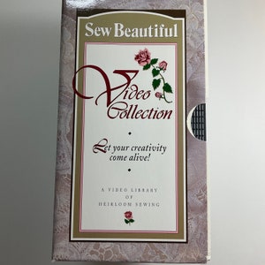May include: A VHS video collection titled "Sew Beautiful" with a rose design and the text "Let your creativity come alive! A video library of heirloom sewing."