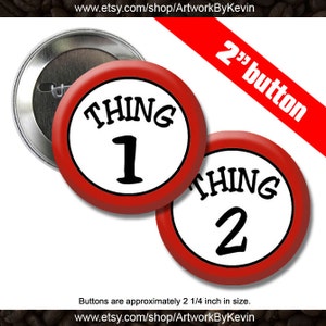 May include: Two 2-inch diameter red and white button pins. The first button says "THING 1" in black text. The second button says "THING 2" in black text.