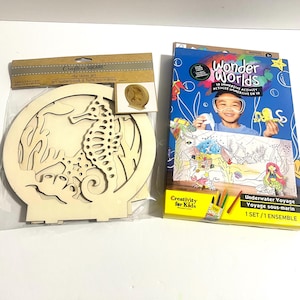May include: A Crafter's Square DIY layer art kit featuring a wooden seahorse cutout in a circular frame, alongside a Creativity for Kids Wonder Worlds 3D immersive activity set titled Underwater Voyage, which includes coloring materials and a 3D scene.
