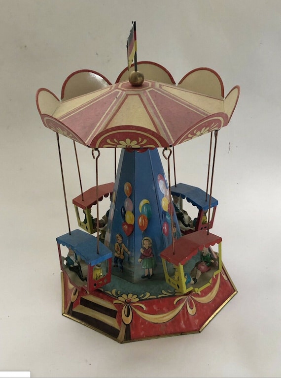 tin carousel toy