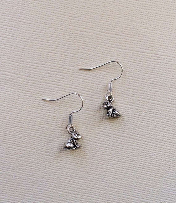Items similar to Silver Puppy Earring on Etsy