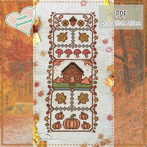 Könnte beinhalten: Ein Kreuzstichmuster mit Herbstmotiven. Das Design umfasst ein Haus, Kürbisse, Pilze und Blätter, alles in dekorativen Rahmen eingefasst. Der Text "PDF Cross-Stitch Pattern" ist sichtbar.