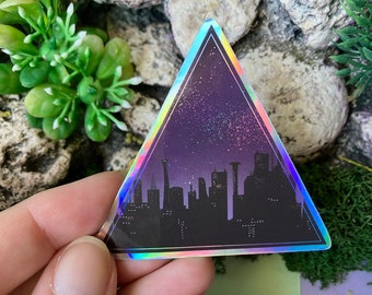 Night Skyline Holographic Vinyl Sticker to decorate your laptop, waterbottle, notebooks, etc.