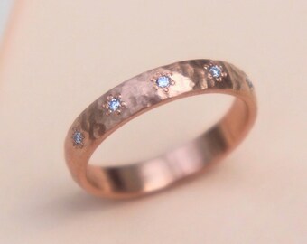 9ct solid rose gold 3.5mm wide hammered floral diamond set wedding ring. Available in 9ct and 18ct rose, yellow or white gold