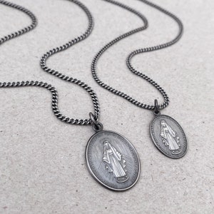 Oxidised or polished solid silver small or large oval Miraculous Medal pendant on a choice of curb or trace chain - Men&#39;s jewellery