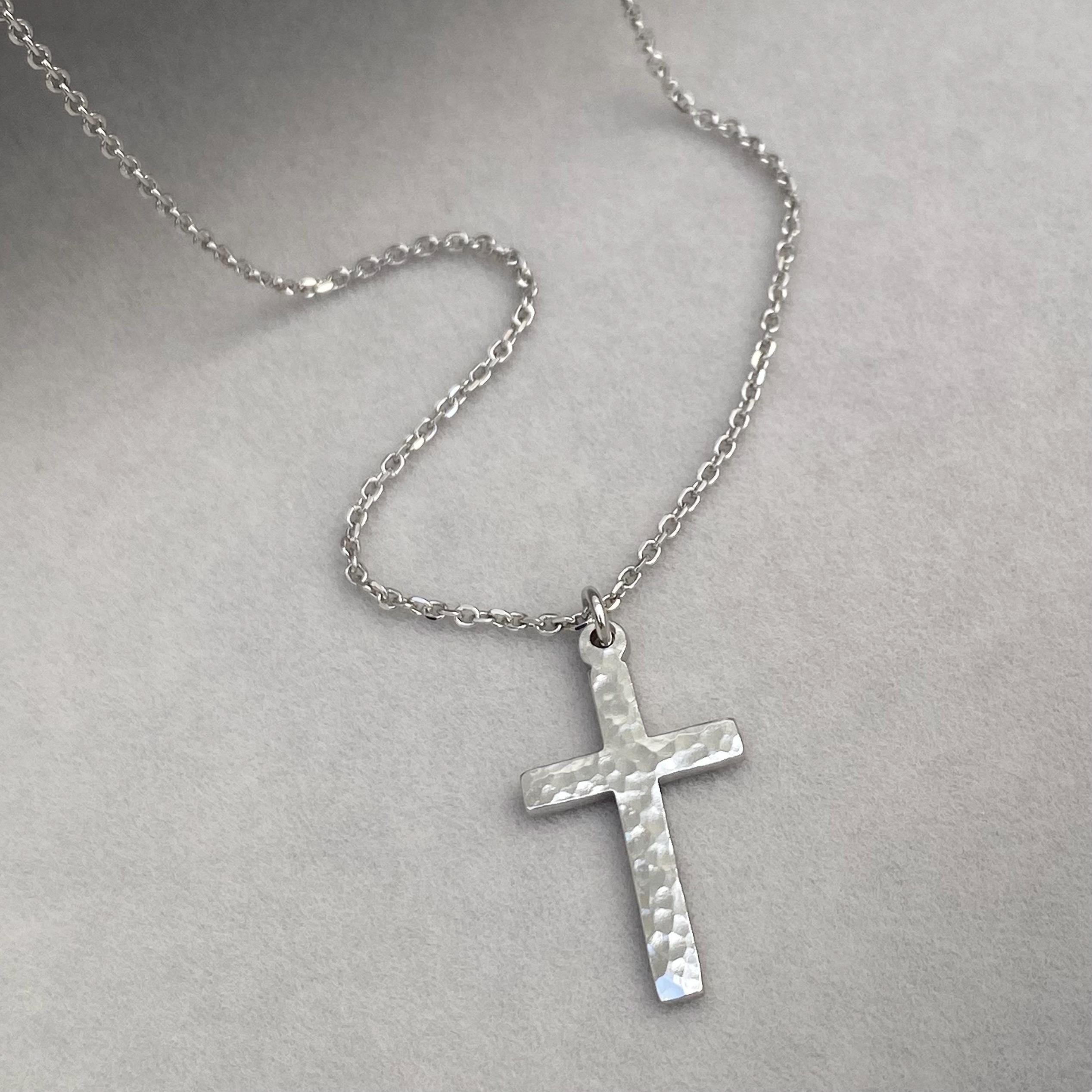 Handmade solid platinum hammered small cross pendant on a 1.2mm wide diamond cut trace chain