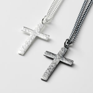 Oxidised or polished medium size solid silver hammered cross pendant on a 2.4mm wide tight curb chain