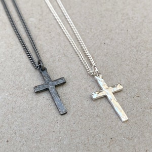 Oxidised or polished small size solid silver hammered cross pendant on a 1.8mm wide tight curb chain