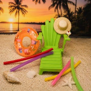 May include: A miniature lime green Adirondack chair with a straw hat, an orange inflatable swim ring with cartoon graphics, a tiny cocktail glass, and several colorful plastic pool noodles arranged on a sandy surface with seashells.