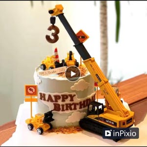 May include: A cylindrical cake with light blue frosting, decorated with brown 'HAPPY BIRTHDAY' text and white clouds. It features a large yellow toy crane, yellow construction vehicles, a traffic cone, and a brown number 3 cake topper.