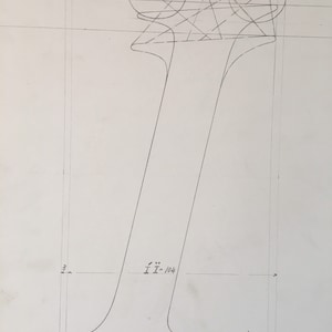 May include: A pencil drawing of the letter "I" with construction lines and circles at the top. The drawing includes measurements and the text "I I - 104" and "100 - I I 10%."