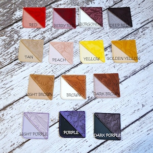 May include: A set of 12 leather corner bookmarks in various colors, including red, berry red, burgundy, deep red, tan, peach, yellow, golden yellow, light brown, brown, dark brown, light purple, purple, and dark purple.