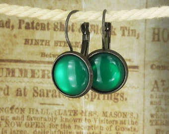 Earrings green and anthracite - cabochon earrings with almost black settings and shiny green cabochons