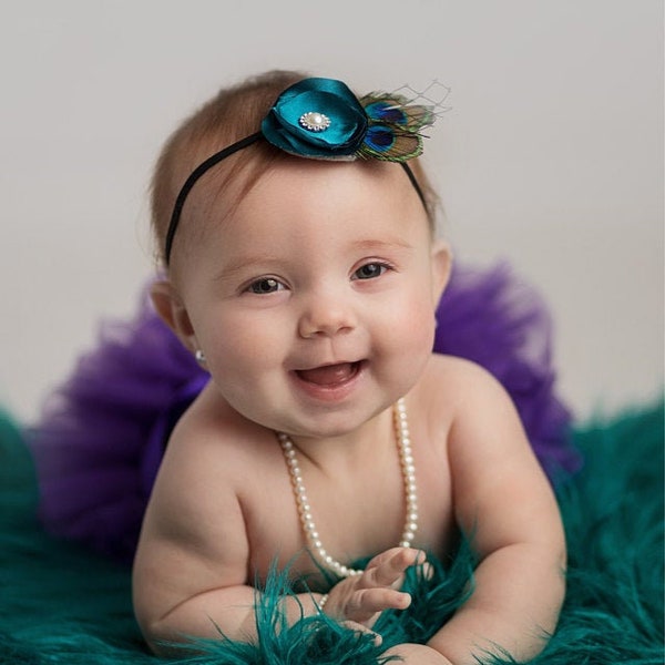 Teal Satin Lollipop Flower headband with peacock feathers, french netting, and Rhinestone or Pearl Center Stone