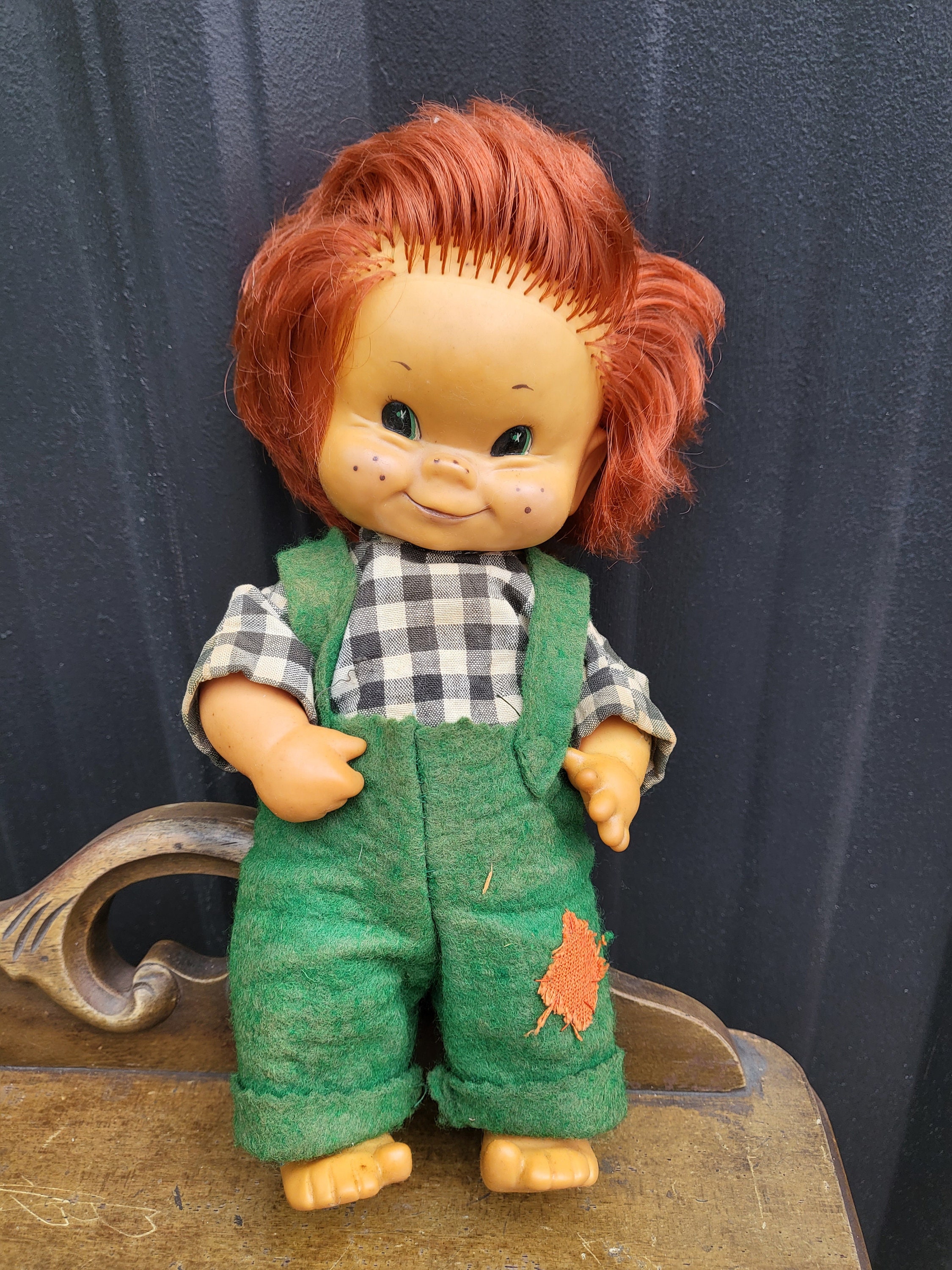 Porcelain dolls on stands. Approximately 16 inches high