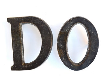 Bronze letters DO. Cure procrastination! Vintage bronze Signage Letters D and O