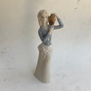 Laphin style Mary Magdalene with Urn ceramic figurine