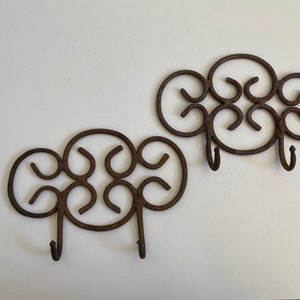 Two Handmade Wrought Iron Sets of Double Hooks