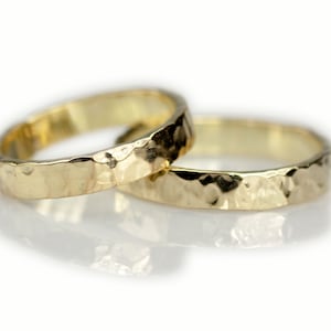 plain robust wedding rings hammered 585 yellow gold