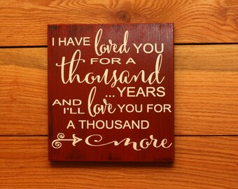 I Have Loved You For A Thousand Years sign