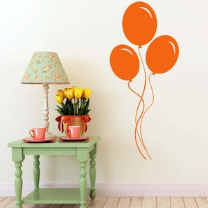 Floating balloon shapes in a minimalist design, great for modern or eclectic decor.