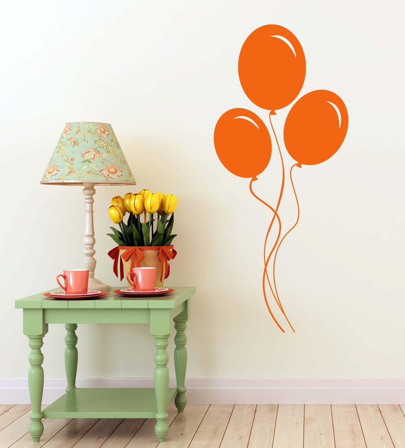 Floating balloon shapes in a minimalist design, great for modern or eclectic decor.