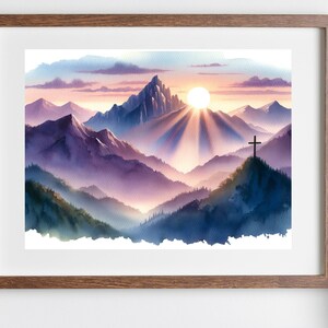 May include: A watercolor painting of a mountain range with a cross on a peak. The sun is setting behind the mountains, casting rays of light across the sky. The mountains are painted in shades of purple, blue, and green.