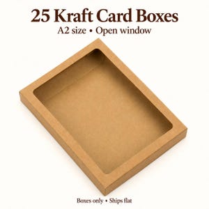 May include: A set of 25 brown kraft card boxes in A2 size, featuring an open window design. The text on the image reads 25 Kraft Card Boxes, A2 size, Open window, and Boxes only, ships flat. These rectangular boxes are made of paper.