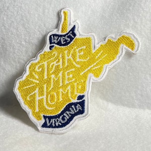 May include: Yellow embroidered patch shaped like the state of West Virginia with the words "Take Me Home" and "West Virginia" in white lettering.