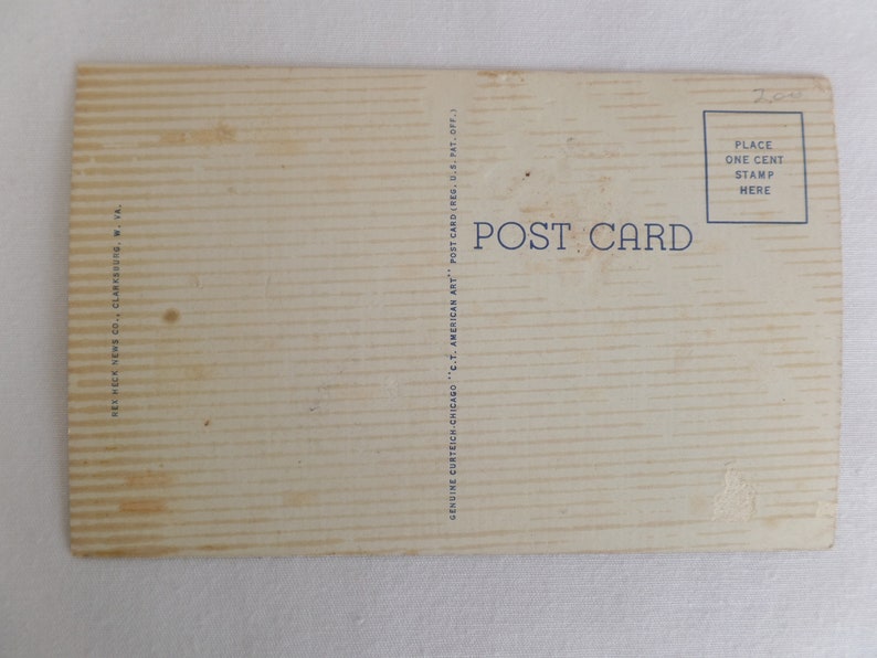 May include: A vintage postcard with a white background and blue text that reads "POST CARD". The postcard has a place for a stamp and the text "PLACE ONE CENT STAMP HERE".