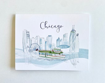 May include: Watercolor illustration of the Chicago skyline with the text "Chicago" in cursive. The skyline includes the Willis Tower, the John Hancock Center, and the Chicago River. A ferry boat is in the foreground.