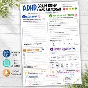 May include: A white ADHD brain dump and task breakdown planner sheet with blue and black text. It features sections for brain dumping, picking a project, breaking tasks into steps, and planning the next small step, plus a progress tracker.