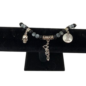 Handmade Halloween bracelet W/Hanging Skeleton And 2 Other Great Charms.