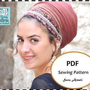 May include: A PDF sewing pattern for a head wrap with a brown fabric base and gold and white trim. The pattern is by Sara Attali.