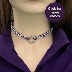 May include: A silver chain choker with a purple accent and a silver ring clasp. Click for more colors.