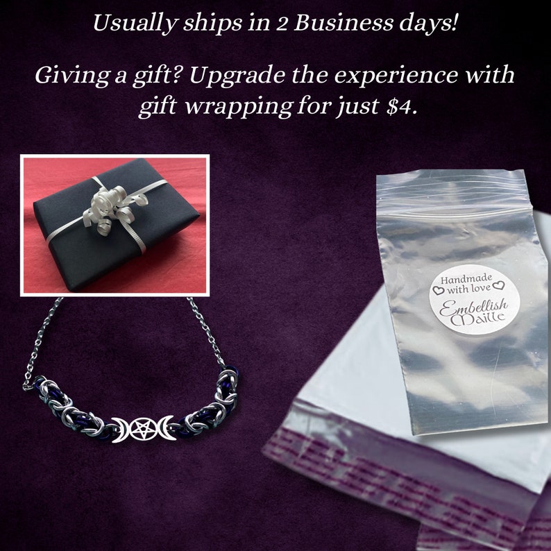 May include: A silver necklace with a triple moon pendant and blue beads. The necklace is packaged in a clear plastic bag with a sticker that says "Handmade with love Embellish Daille".