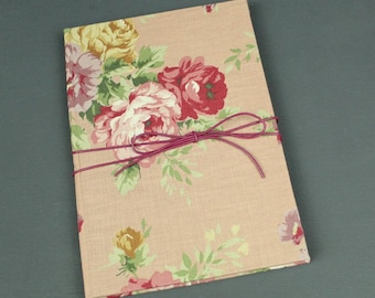 Notebook antique pink with rose pattern and leather strap closure