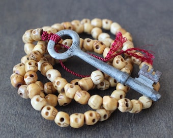 Carved Yak Bone, Skull Mala Necklace with Red Silk Thread and Authentic Skeleton Key, 108 Beads, Antique Key, Skull Beads, Ethically Sourced