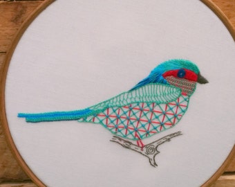 Bright hand embroidered bird