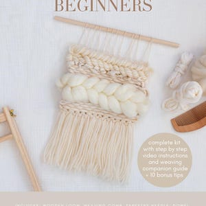 May include: A beginner's weaving kit with a woven wall hanging in cream and beige tones. The kit includes a wooden loom, weaving comb, tapestry needle, dowel, and fiber. The text reads "WEAVING KIT FOR BEGINNERS".