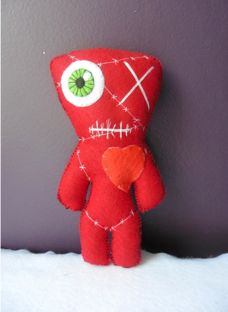 red voodoo doll