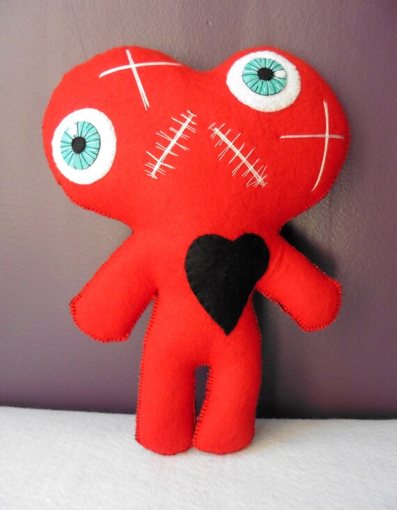 red voodoo doll