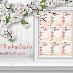Puede incluir: Nueve tarjetas de intercambio de artistas en blanco con un diseño floral. Las tarjetas miden 2,5 pulgadas por 3,5 pulgadas. El texto en las tarjetas dice "Artist Trading Card".