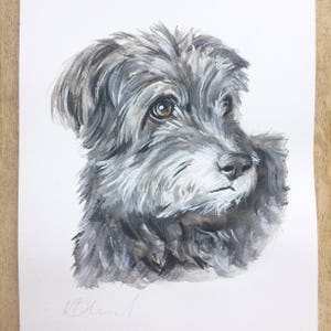 May include: Watercolor painting of a gray and white dog with brown eyes. The dog is looking to the right of the image. The painting is signed in the bottom left corner.