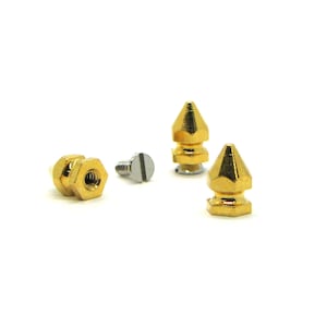 10mm 24kt gold screwback hex spikes. Bag of 100. Leathercraft or glue-on StudsAndSpikes