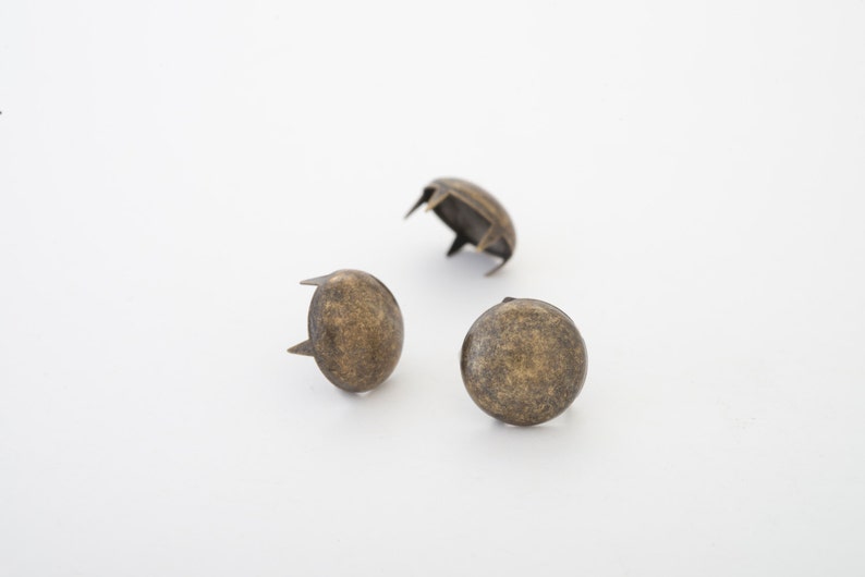 Antique brass bag of 100 12mm multi-pronged garment dome studs