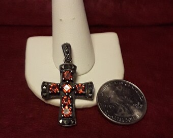 Orange Sesspatine garnet & Marcesite Sterling silver cross pendant.