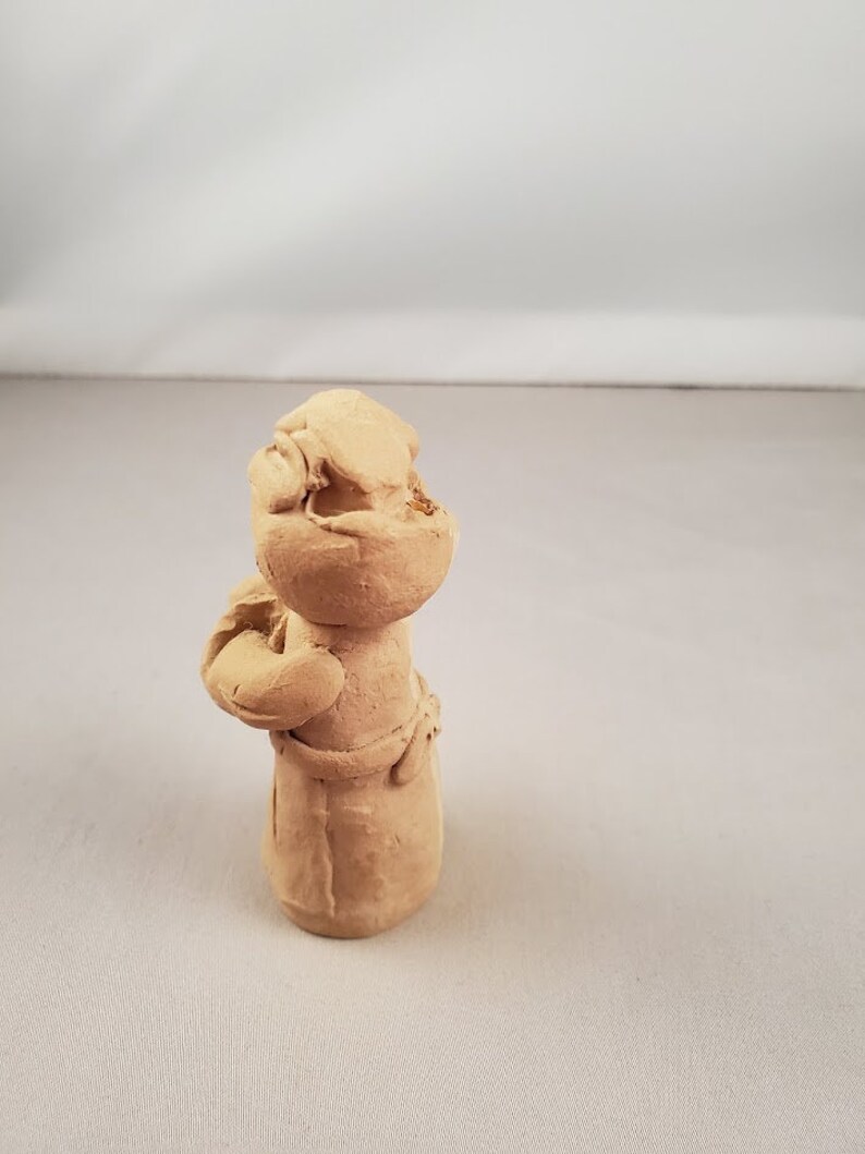 unpainted pecan resin figurines